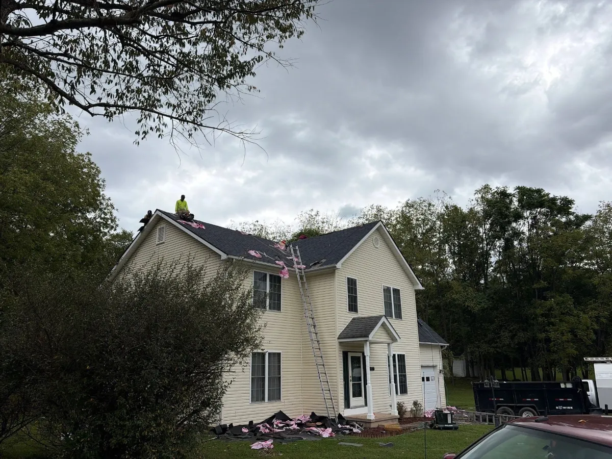 Front of the farmhouse-style home with its new Onyx Black roof in Arden, Inwood, WV