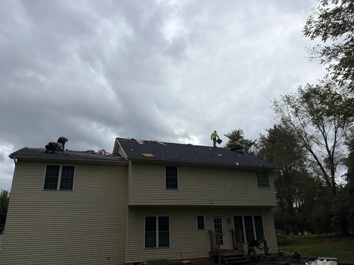Rear of the home with the finished roof in Arden, Inwood, WV