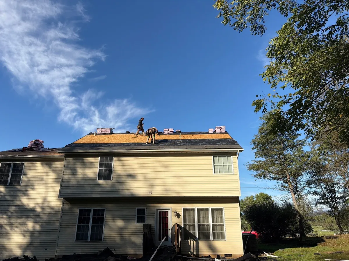 Bare roof decking ready for new underlayment in Arden, Inwood, WV