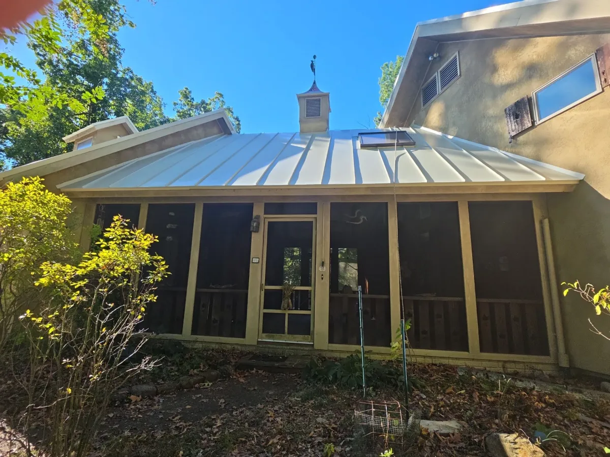 Screened porch and cupola under the new standing seam metal roof in Falling Waters, WV