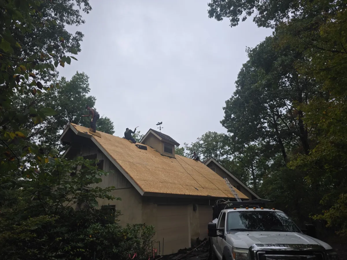 Original shingle roof at the start of tear-off in Falling Waters, WV