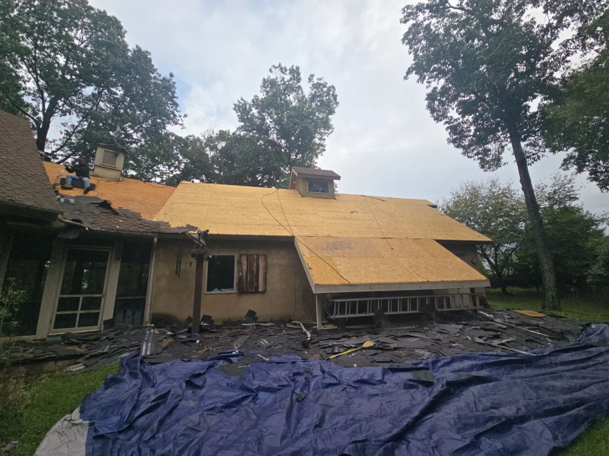 Tarps protecting the property during tear-off in Falling Waters, WV
