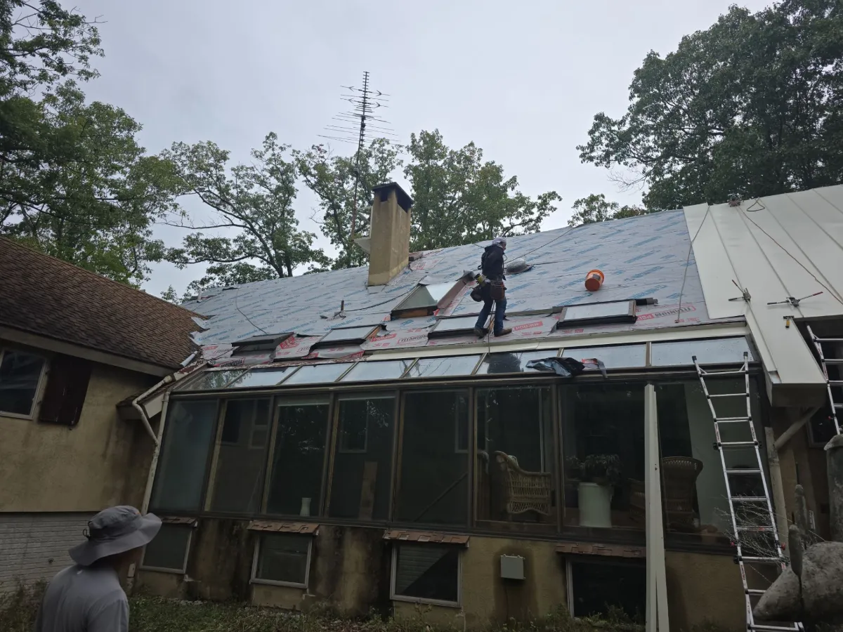 Standing seam metal panels going on in Falling Waters, WV