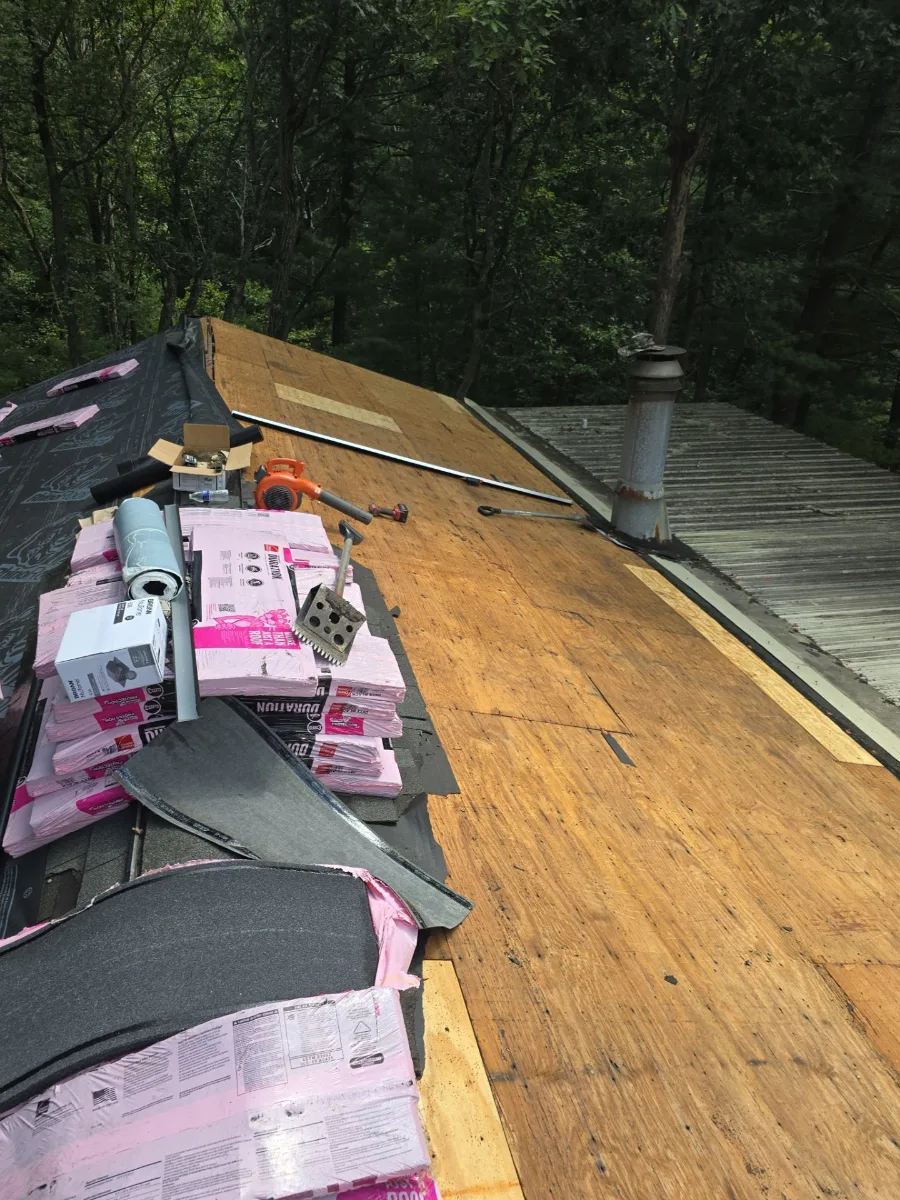 Owens Corning shingle bundles staged on a Gerrardstown, WV roof