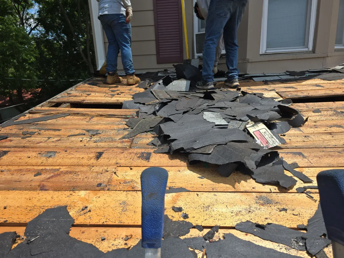 Original board decking exposed during tear-off in Hagerstown, MD