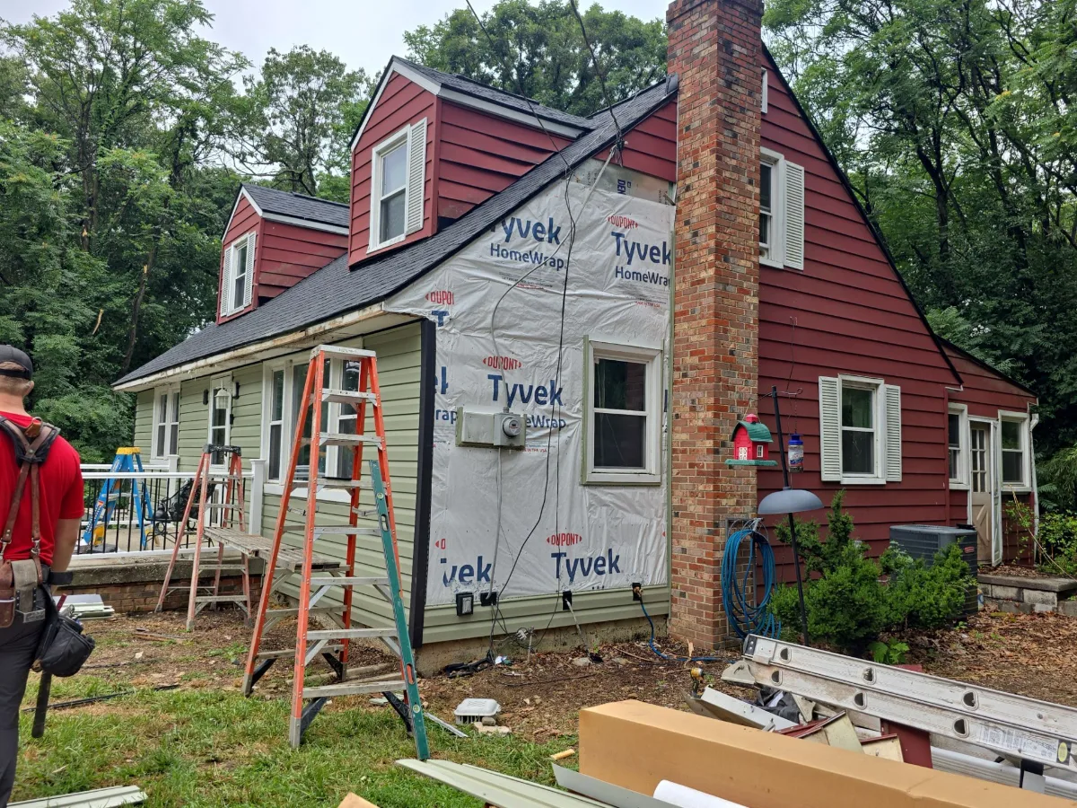 New siding being installed on a home in Harpers Ferry, WV
