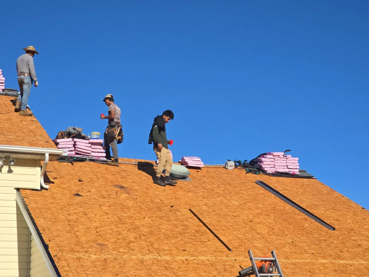 Crew working on the exposed roof decking in Keedysville, MD