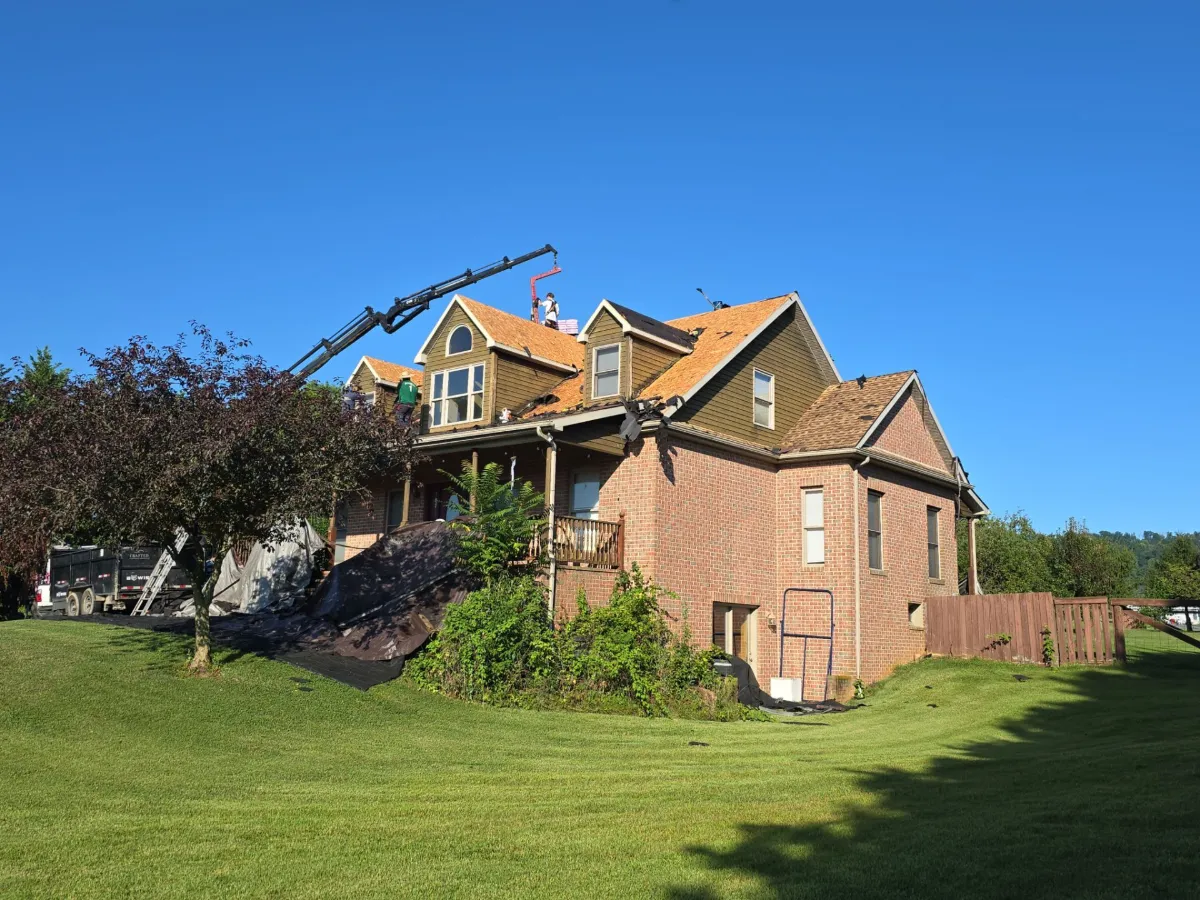 Large brick home at the start of the roof replacement in Martinsburg, WV