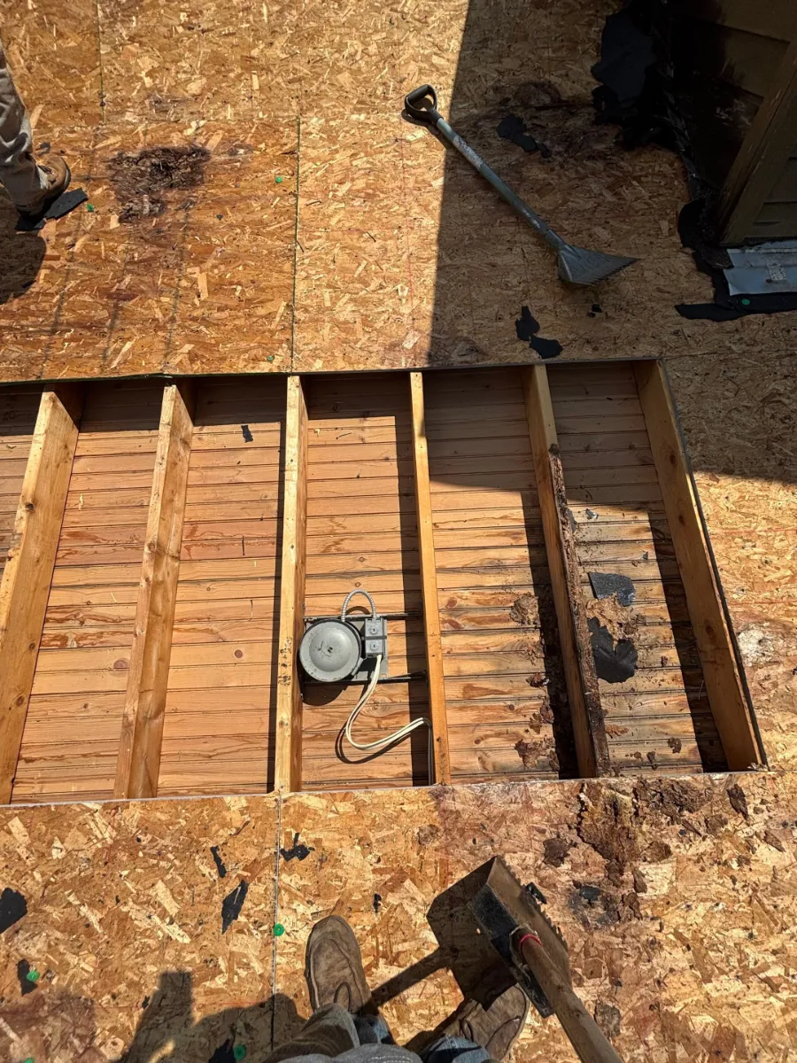 Roof section opened down to the rafters during the replacement in Martinsburg, WV