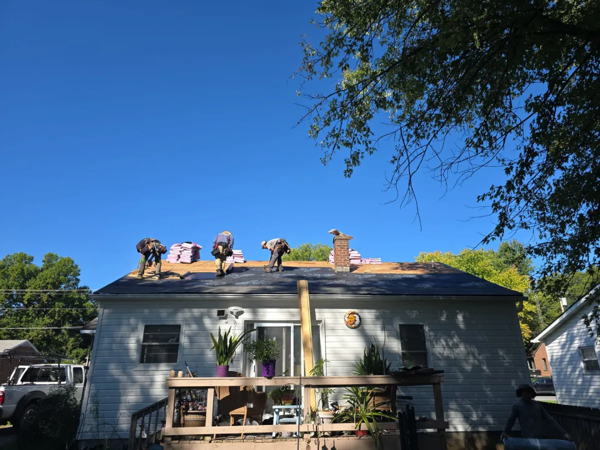 Old shingles being torn off the house in Martinsburg, WV