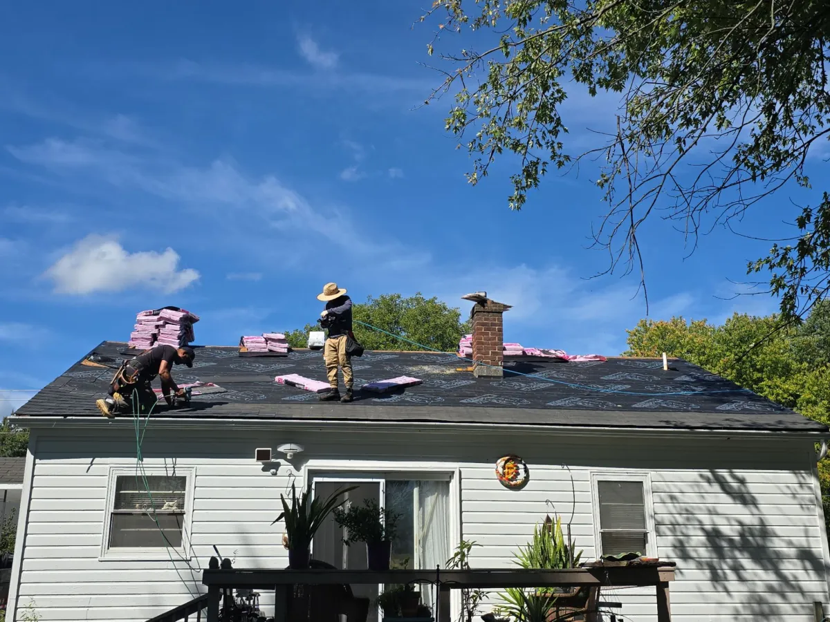 Crew installing Owens Corning ProArmor synthetic underlayment in Martinsburg, WV