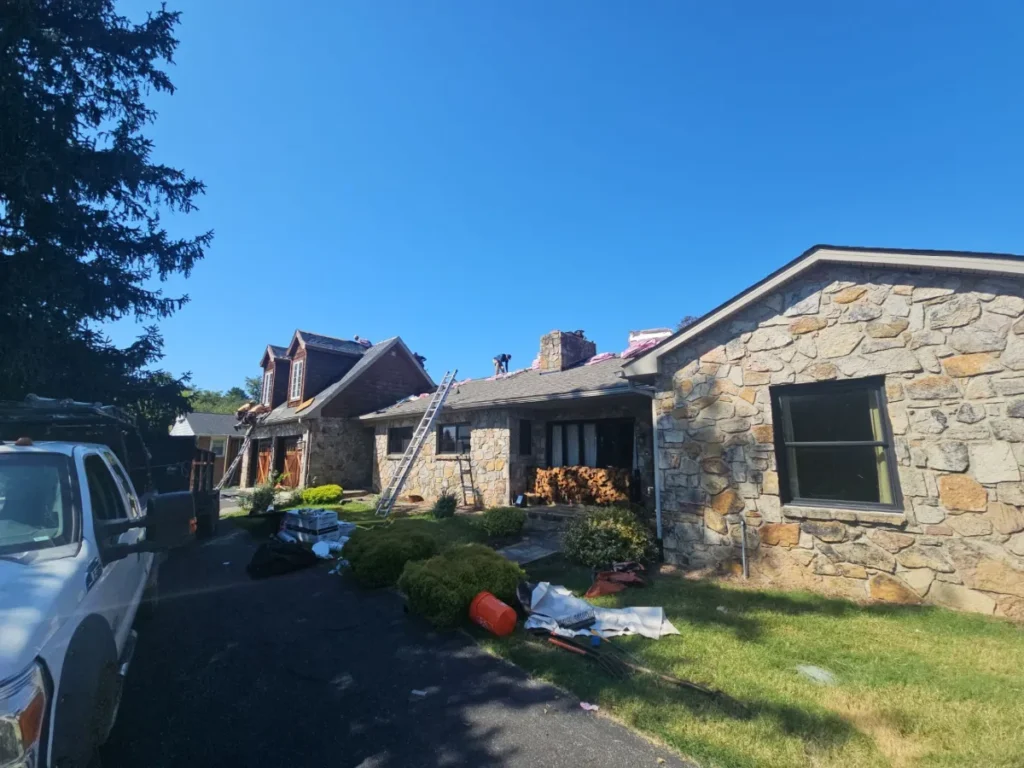 Finished Owens Corning Duration roof on a stone ranch home in Martinsburg, WV