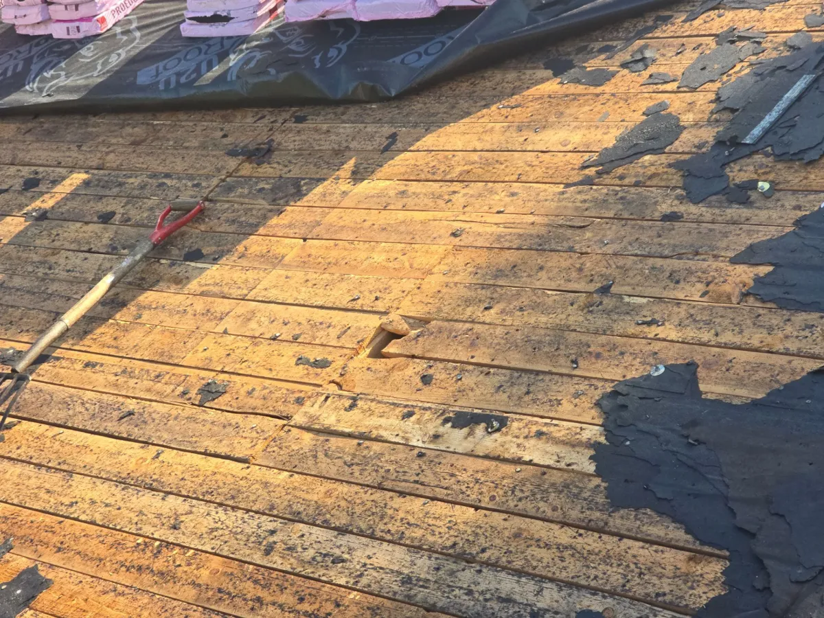 Original board decking exposed after tear-off in Martinsburg, WV
