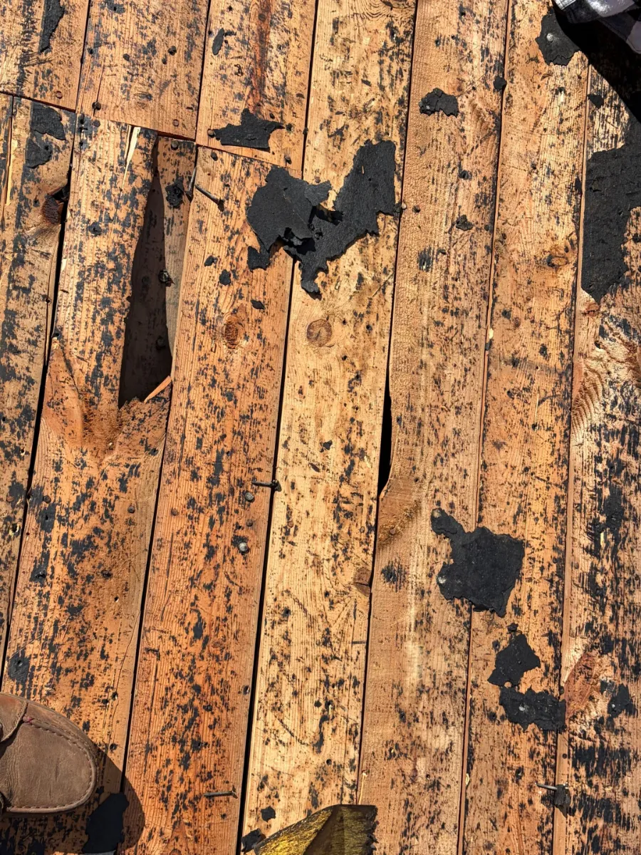 Weathered original roof boards uncovered during tear-off in Martinsburg, WV