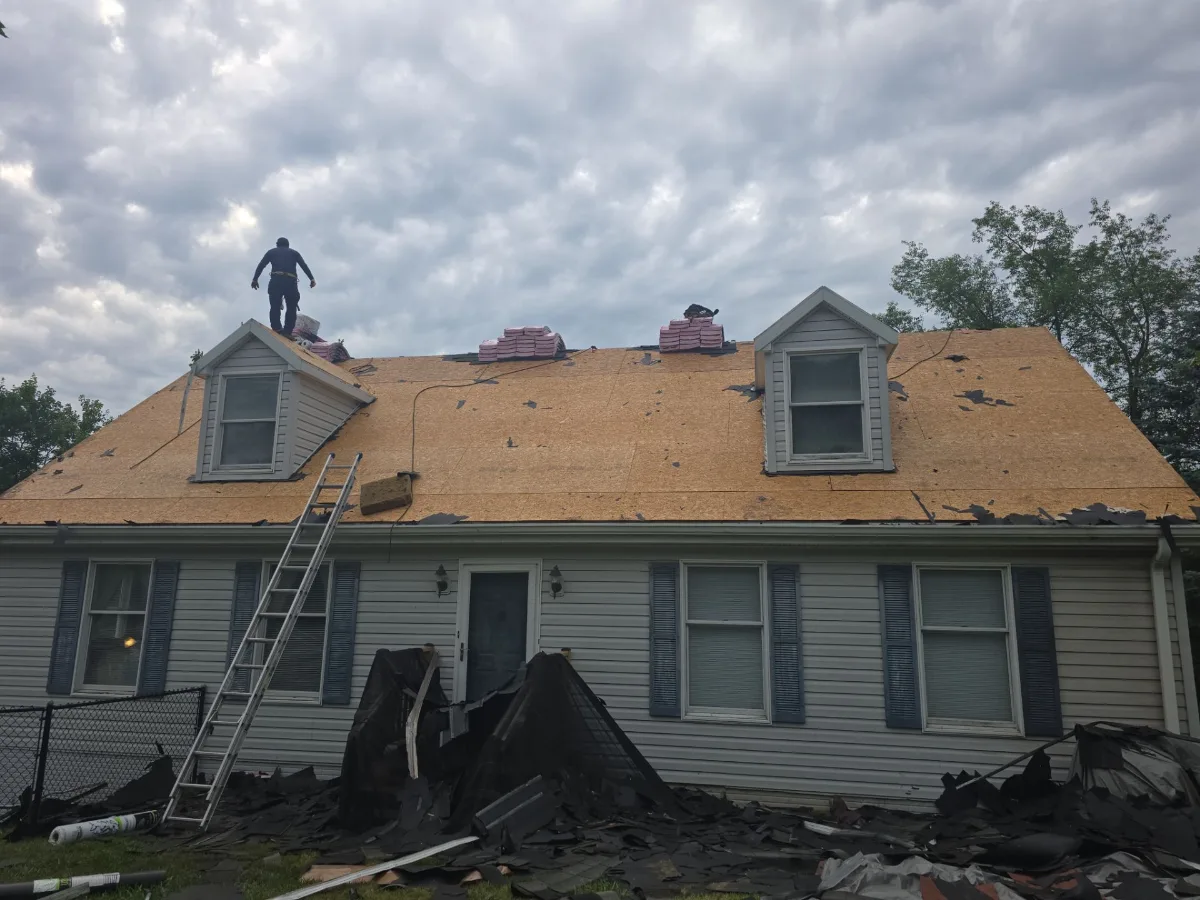 Old roof torn off a Cape Cod home with dormers in Mercersburg, PA