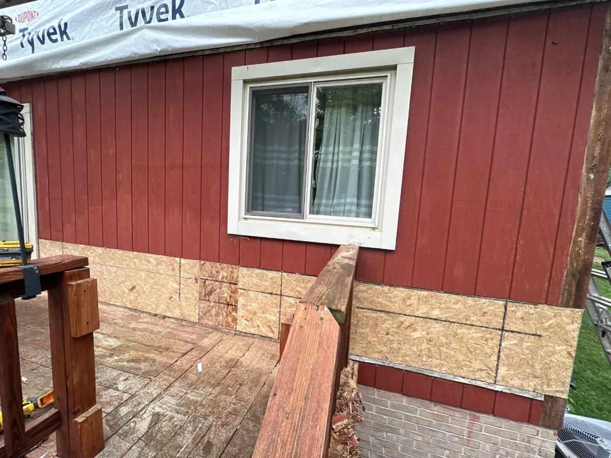 Worn lower siding below a window before replacement in Robinwood, Hagerstown, MD