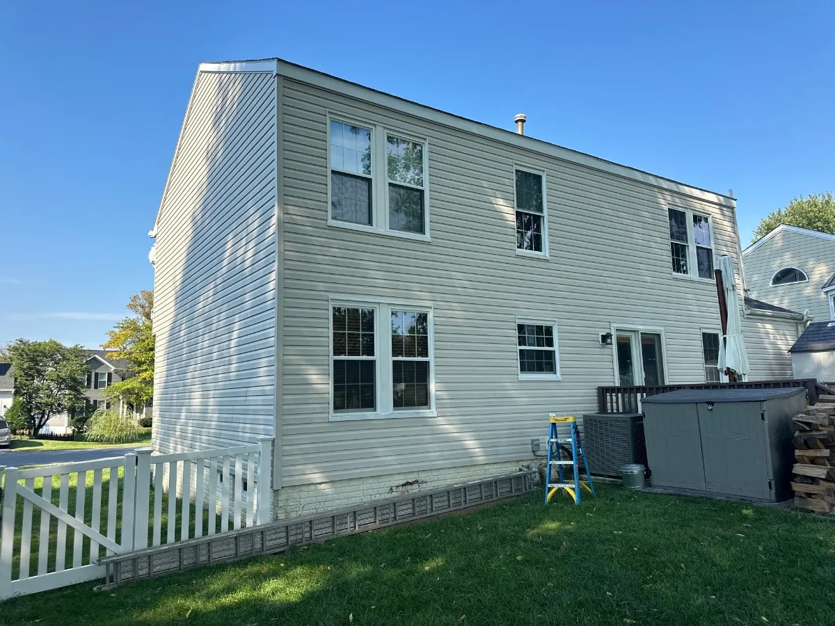 Rear wall of a Williamsport, MD home with new vinyl siding
