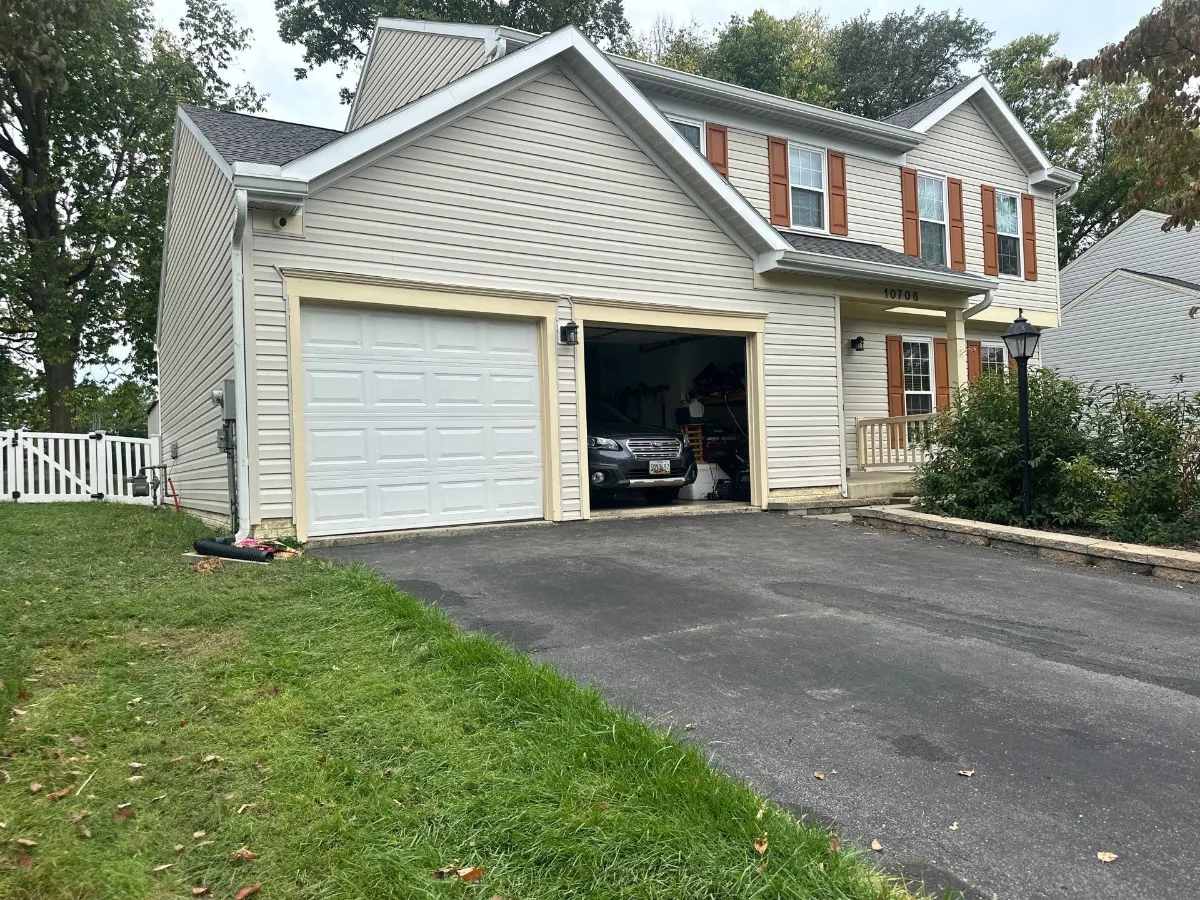 Garage side of a Williamsport, MD home after new siding